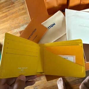 Louis Vuitton Yellow Exotic multiple wallet Crocodile